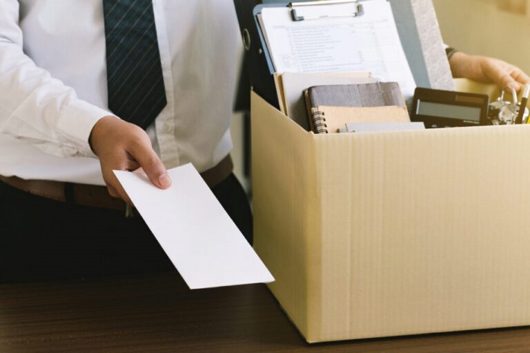 Resignation.Businessman sending  letter of resignation to the executive in order to resign dismiss contract, Quitting a job, "The big quit.The great Resignation.